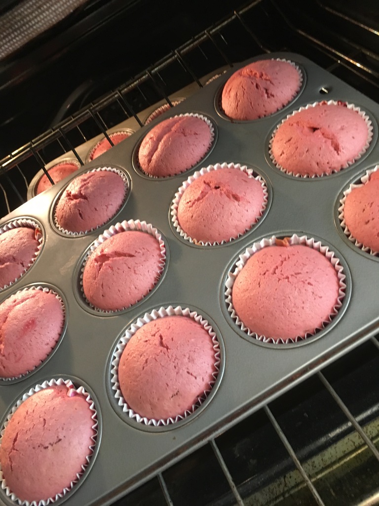 pink cupcakes done baking
